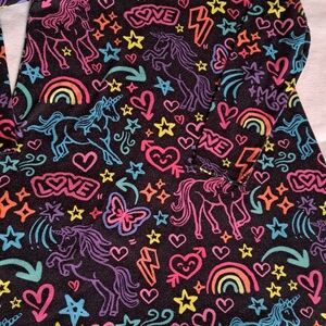 Place Black Sleepwear with Pink and Blue Accents